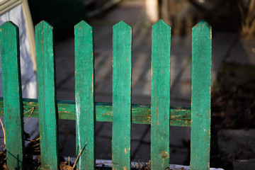 An old green wooden fence