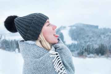 Portrait Happy woman traveler on the snowy of mountain look on t