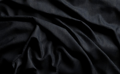 Abstract dark wrinkle fabric.Canvas texture detail in the dark.Smooth elegant dark silk or satin luxury cloth texture.3d illustration