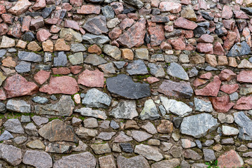 A stone granite high fence