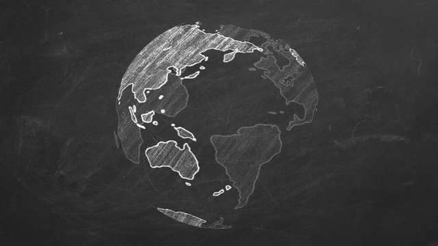 Rotating globe hand drawn with chalk on a school blackboard