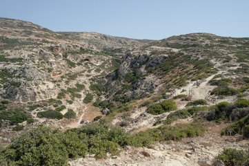 the road to Red beach through the mountains. The resort of Matala, Crete, Greece