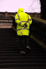 sweeper going up the stairs