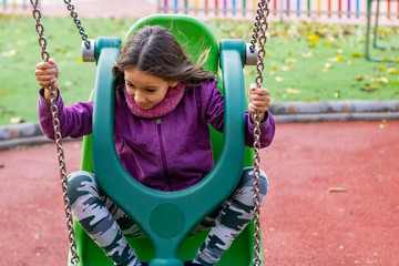 Little girl playing in park