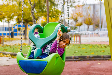 Little girl playing in park