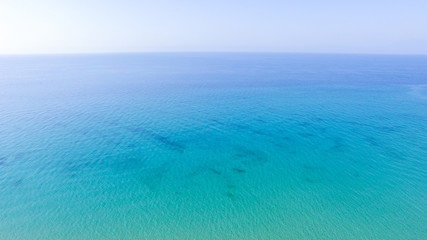 Fototapeta na wymiar Aerial view of open turquoise crystal clear sea 
