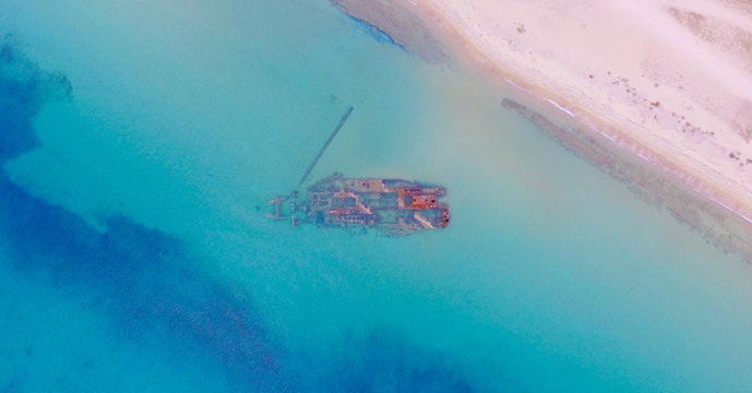 Epanomi shipwreck. Aerial view of of shipwreck in the blue turquoise sea. 