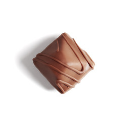 Candy decorated with chocolate glaze on white, isolated