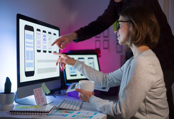 The UX user interface designer is developing for mobile phone applications.