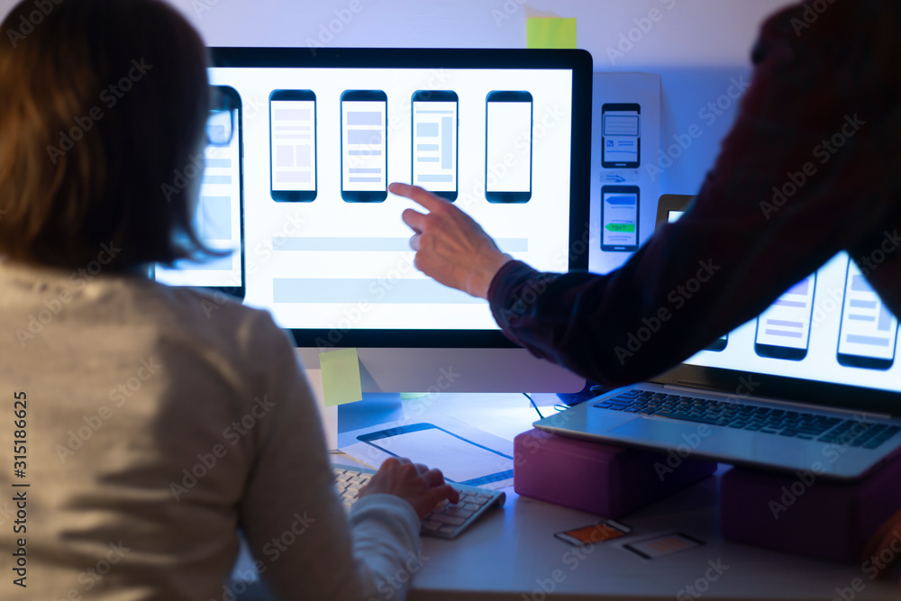 Poster designers create a user interface for mobile phones. website development. user experience.