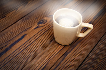 tasty coffee on a wooden background