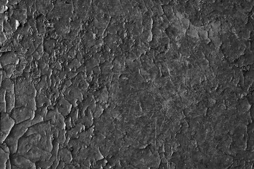 Cracked black paint. Seamless old texture background