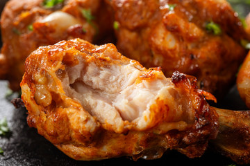 Bitten roasted chicken drumstick