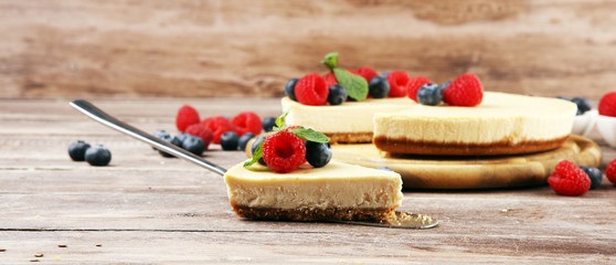 Homemade cheesecake with fresh raspberries and mint for valentines day - healthy organic summer dessert pie cheesecake. Vanilla Cheese Cake for dessert