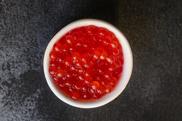 red caviar (seafood, salmon caviar) menu concept. food background. top view. copy space