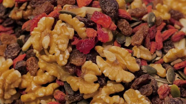 Dried fruit background. Rows of dried dates, apricots, cranberries, fruit market