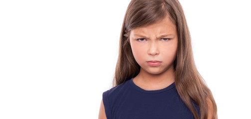 Angry baby girl isolated on white background.