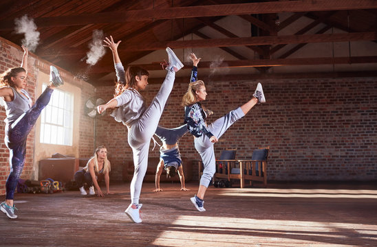 Young hip hop dancers with powder dancing in studio
