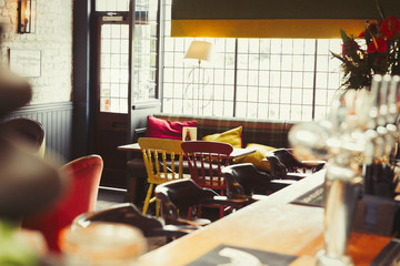Bar and table with cushions in empty bar