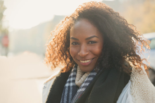 Portrait smiling young woman wearing scarf