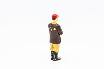 Close up of Miniature Farmer Isolated on White Background.