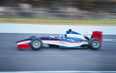 Side view formula one race car on sports track