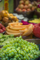 Freshly cut delicious juicy fruits for sale