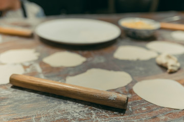 Wooden rolling pin for flattening dough for dumplings