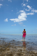 Girl on the beach of Ile aux Benitiers, Mauritius
