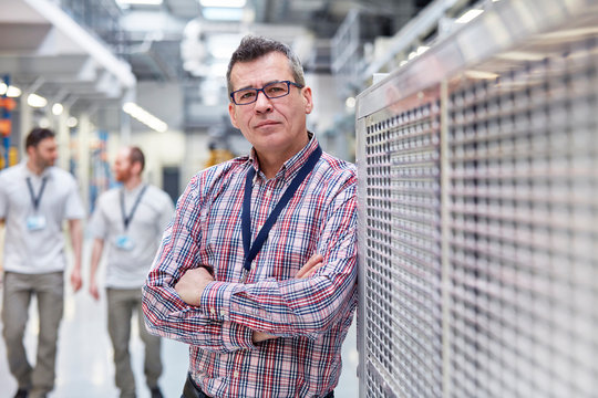 Portrait confident male supervisor in factory