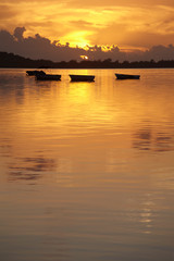 Fototapeta na wymiar Little harbour at sunset in Le Morne Brabant, Mauritius