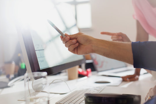 Architects Working At Computer In Office