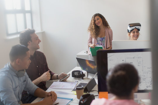 Computer programmers and designers working in office