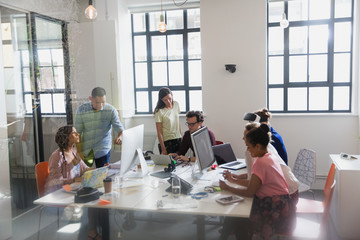 Designers working in open plan office