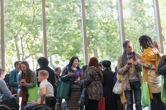 Business people talking at conference