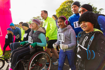 Enthusiastic crowd ready at charity race starting line