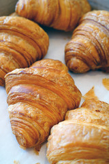 Freshly baked French croissants at a bakery