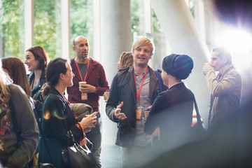Business people talking at conference