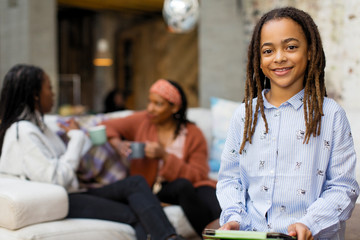 Portrait smiling girl with digital tablet