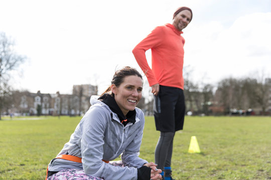 Runners resting in park