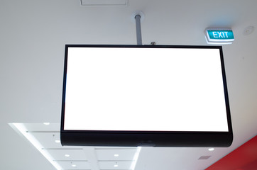Mock up template of blank white digital display screen. Background texture of a ceiling mounted...