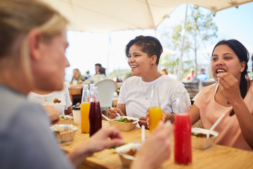 Women eating lunch at farmer‚Äôs market