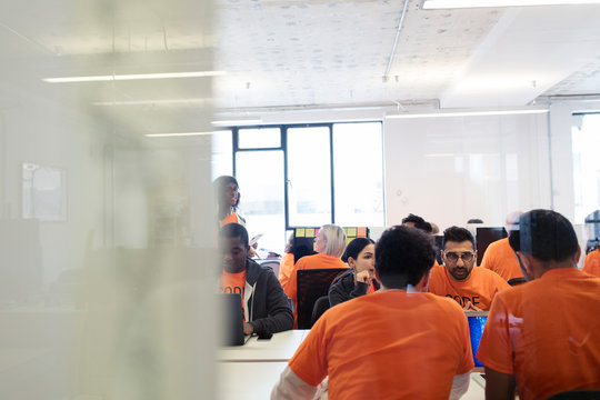Hackers coding for charity at hackathon