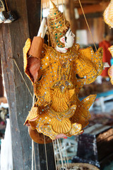 Traditional Burmese puppets hanging on display