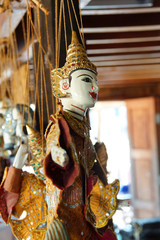 Traditional Burmese puppets hanging on display
