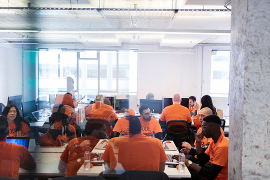 Hackers coding for charity at hackathon