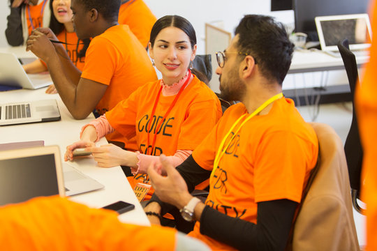 Hackers coding for charity at hackathon