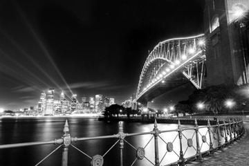 Black and white photo of Sydney Harbour Bridge at night