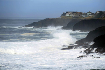 Heavy seas crash on rocks