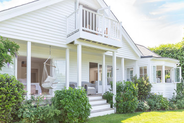 Home showcase exterior white house with patio and garden